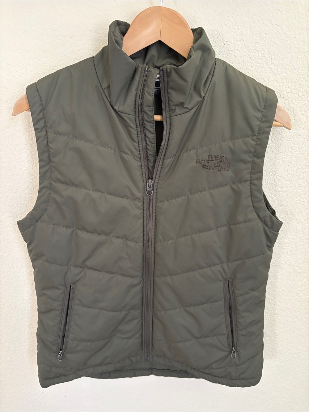 The North Face Olive Green Womenโs Quilted Vest